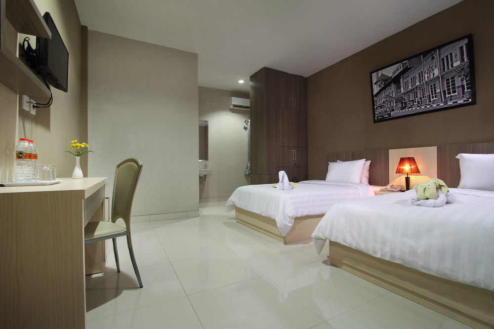 Oyo Flagship 3726 Tembok Batu Residence Tugu Luaran gambar